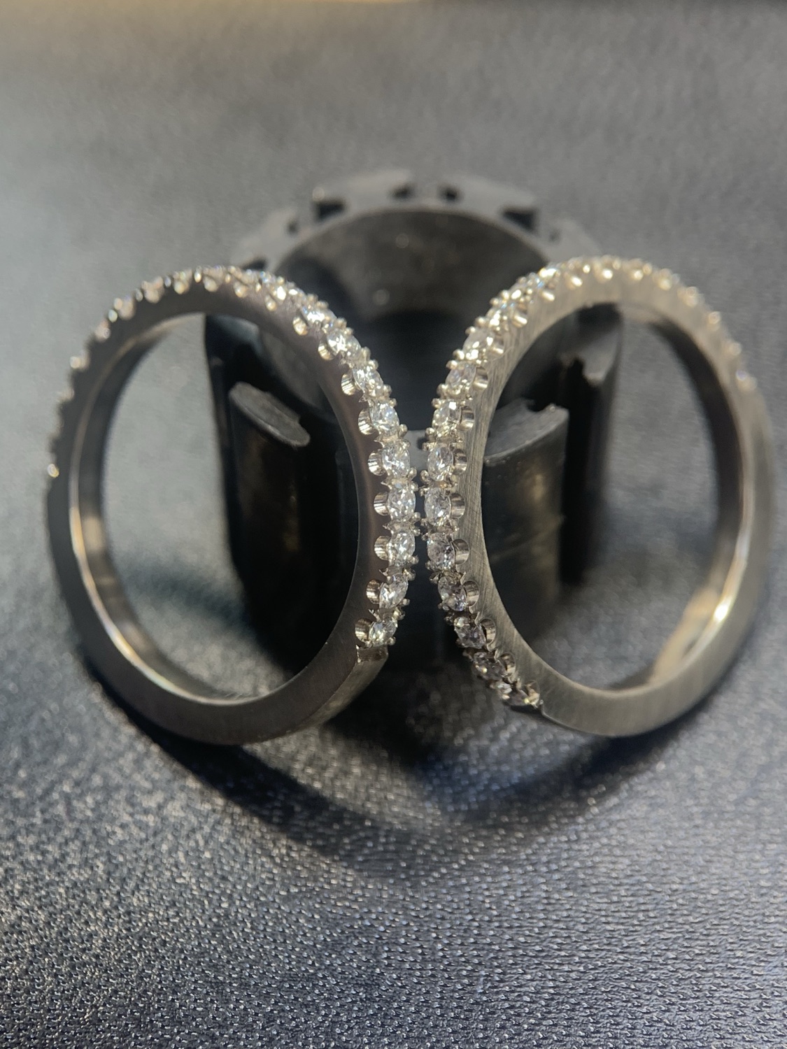Diamond pavé bands in progress at the bench